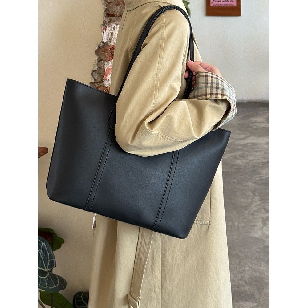 

Винтажная сумка-тоут большой вместимости женская 2025 новая высококлассная нишевая сумка на плечо для поездок на работу повседневная сумка под мышкой чёрный