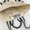 Shoulder bag women's 2025 autumn new trend large-capacity tote bag fashion simple college style commuter canvas bag