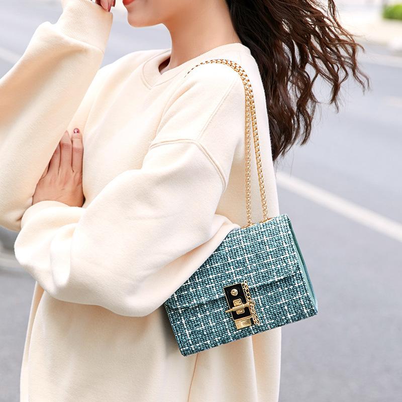Guangzhou women's bags winter fur chic lock chain square bag single shoulder oblique span candy color bag tide