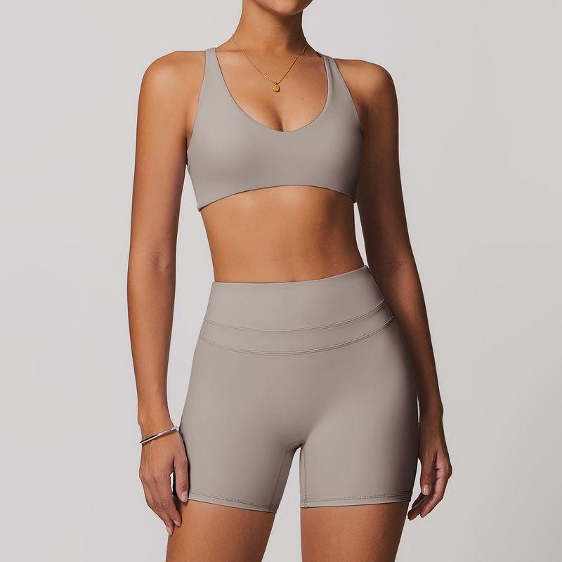 Guangzhou Zechuang Clothing Co., Ltd. Brushed Tight Back Yoga Suit Stretch High Waist Workout Clothes for Women Running