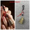 Handcrafted Antique Tibetan Bell Keychain with Braided Cord & Beads, Intricate Carvings