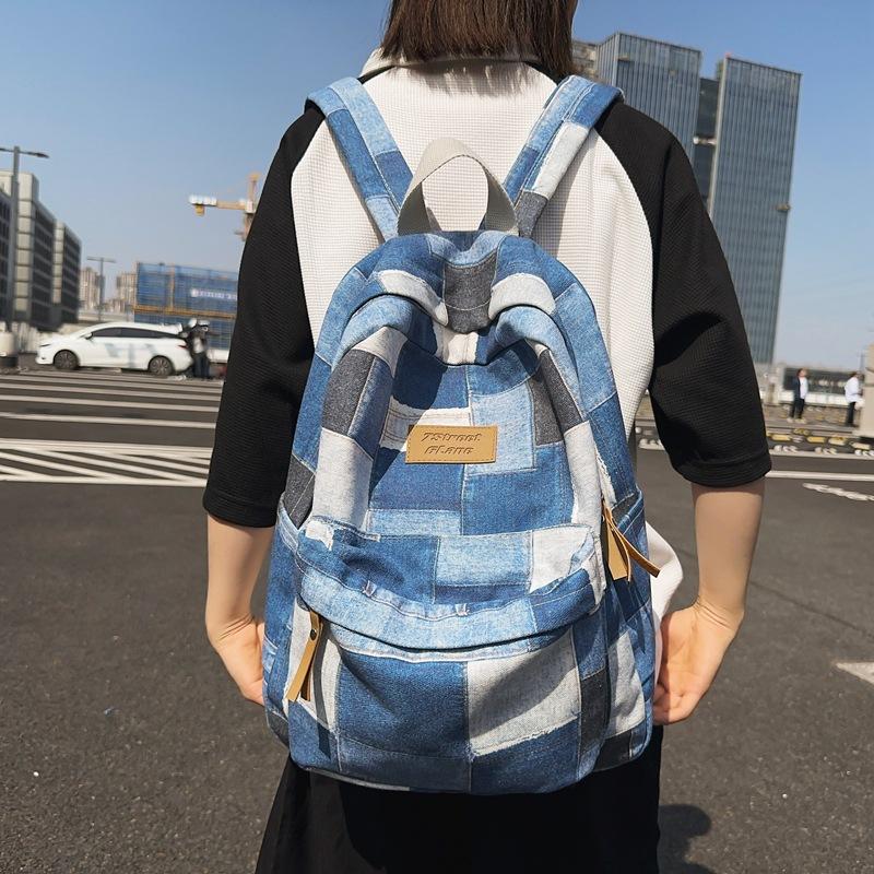 Large-capacity new middle school schoolbag, junior high school backpack, boys' casual versatile college student computer bag, women