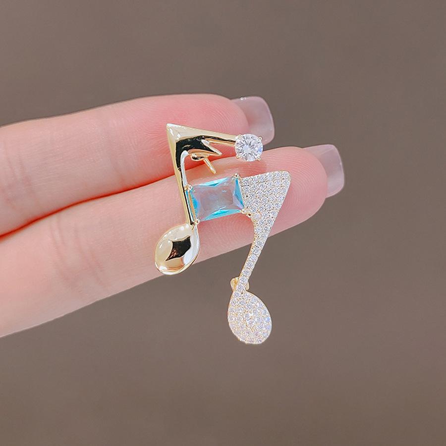 Fashion music note brooch women's high-end sense high-end personality versatile pin niche design high-end corsage versatile accessories