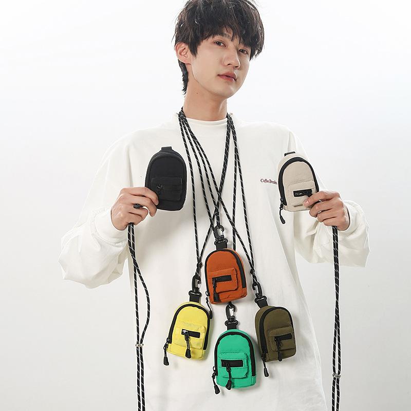 Mini halterneck bags, men's and women's coin purses, headphone bags, trendy brand personalized satchel, key bags, crossbody bags