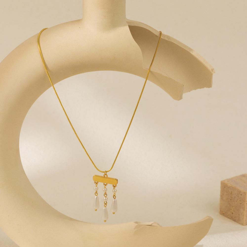 Stylish Geometric Alloy Necklace Featuring Trendy Pearl Pendant And Chic Tassels