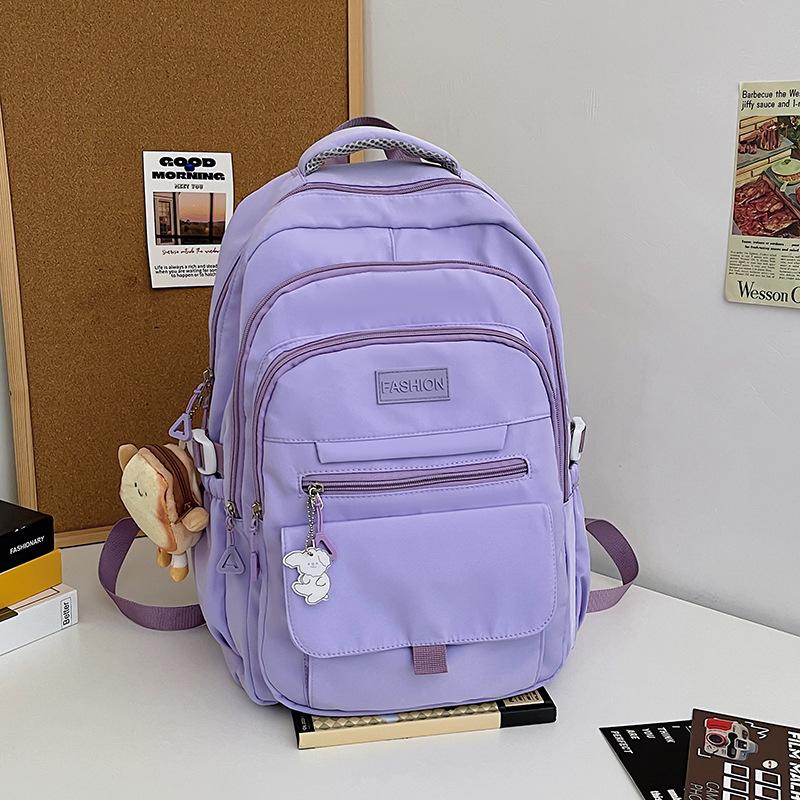 Korean version of simple backpack large capacity junior high school male and female students campus schoolbag backpack light