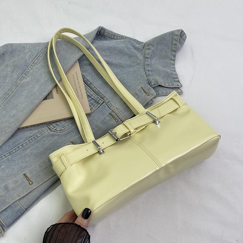 

Trendy and fashionable women s baguette bag, underarm bag, personalized versatile foreign style niche simple solid color shoulder handbag жёлтый