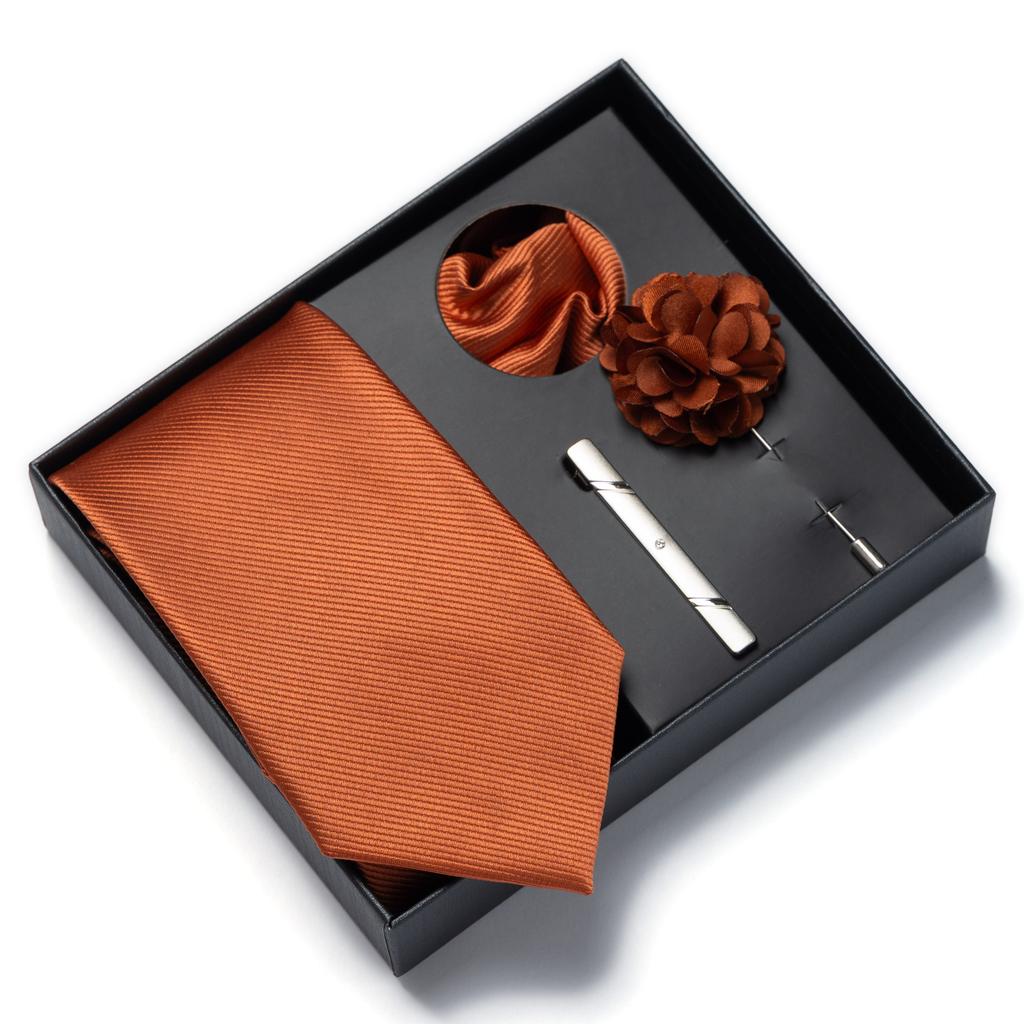This solid color 4-piece men's tie gift set includes a brooch, corsage, and handkerchief. It's a perfect gift for Valentine's Da
