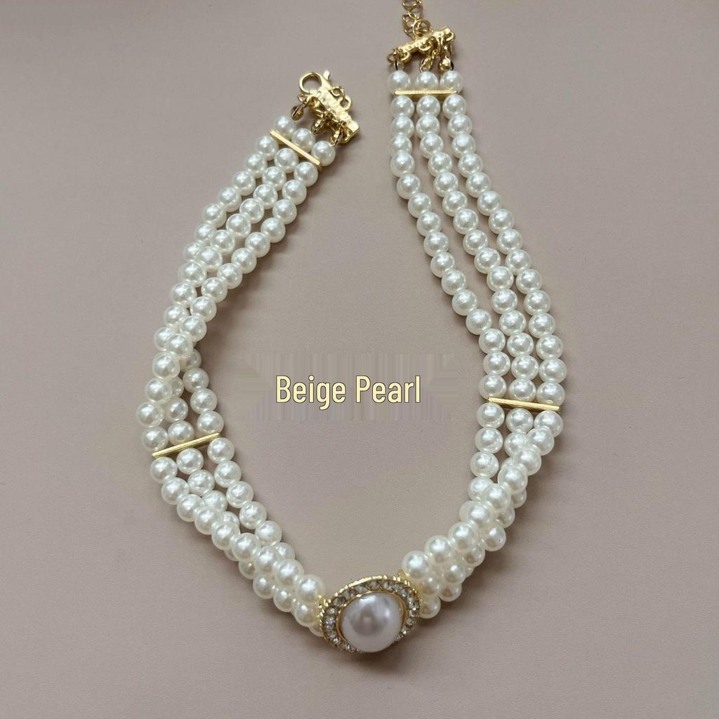 Women's Multi-Layer Pearl & Diamond Oval Necklace: Retro Hepburn Style, Light Luxury, Perfect for Sweaters and Dressy Outfits.