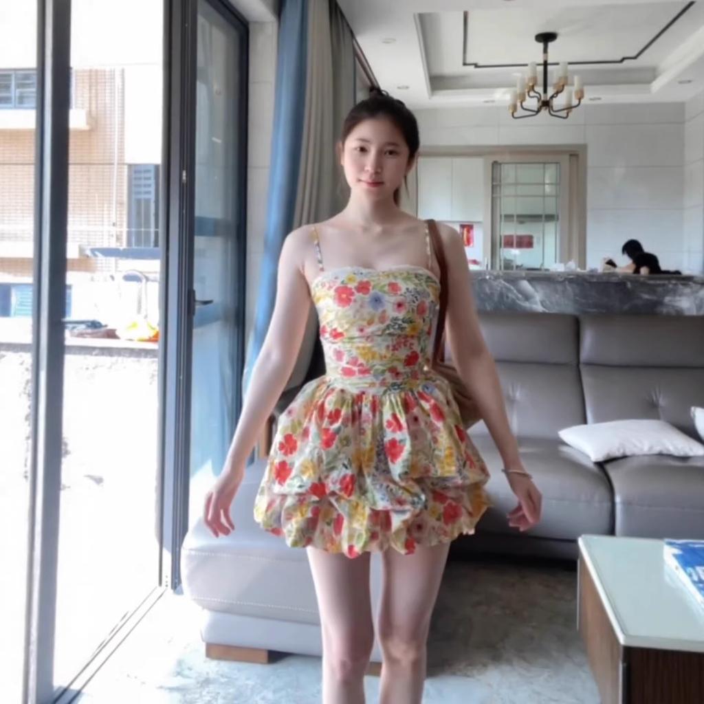 Seaside vacation floral suspender dress women's spring and summer pure desire beautiful temperament waist slim fluffy short skirt
