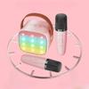 SHOP-STORY - KARAOKIT_RO: Portable Karaoke Kit with LED Speaker and 2 Wireless Bluetooth Microphones with Sound Effects - Pink