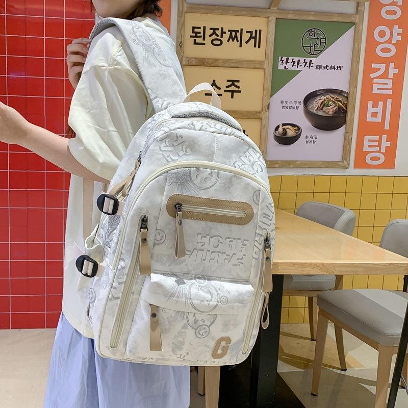 Schoolbag1011 New high school boys backpack large capacity trendy cool graffiti junior high school student schoolbag female campus computer backpack