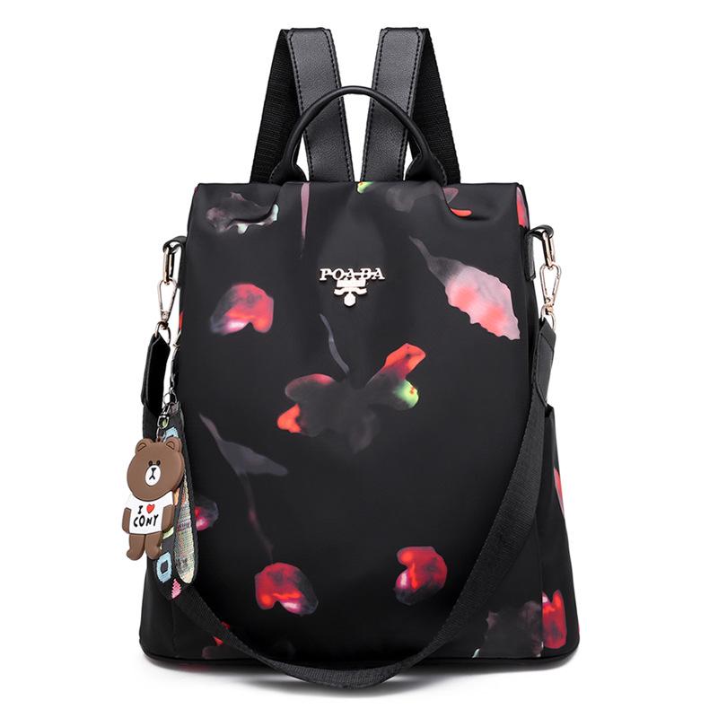 2024 Women's Korean Style Fashion Backpack: Versatile Oxford Cloth Anti-theft Design with Pendant