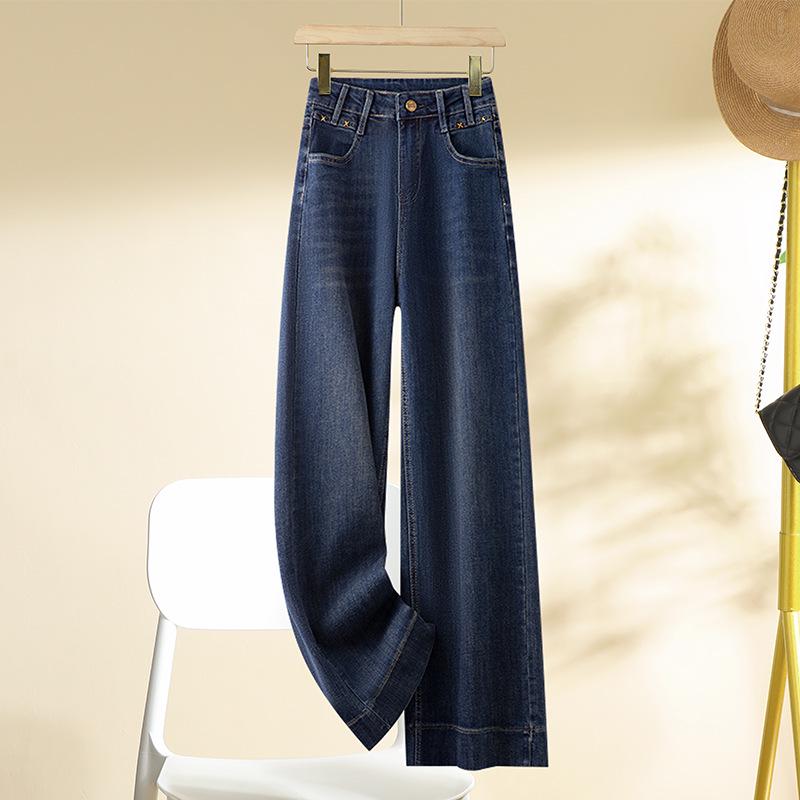 

Женские темно-синие джинсы с высокой посадкой и широкими штанинами на флисовой подкладке - Осень/Зима 2024 28