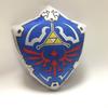 Morbido e Comodo Cuscino Peluche Cartone Animato di Zelda con Design dello Scudo Hylian