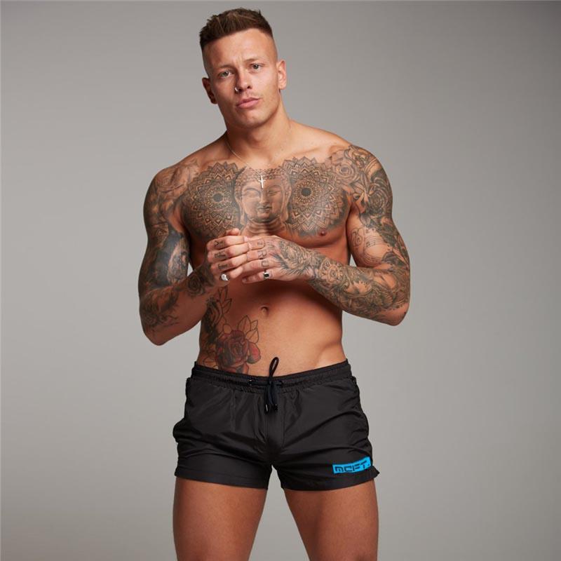 

Muscleguys Summer Bodybuilding Beach Jogging Short Pants Mens Basketball Training Shorts Gym Fitness Sport Breathable Quick Dry Shorts M чёрный