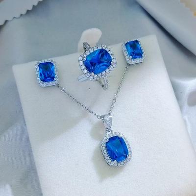 European & American Sapphire-Inspired Jewelry Set: Versatile Necklace, Ring & Earrings Adorned with Full Diamonds for Women.