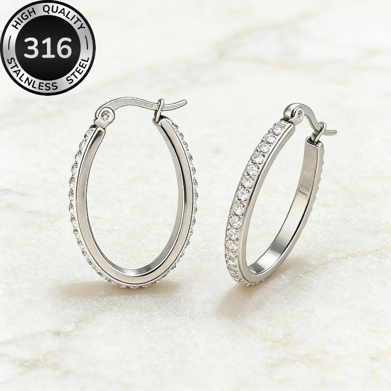 

European and American popular oval diamond earrings, high-end fashion gold stud earrings, simple temperament, niche stainless steel earrings