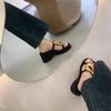 French black thick-bottomed cool slippers women's 2025 summer new niche fashion simple metal one-word beach slippers