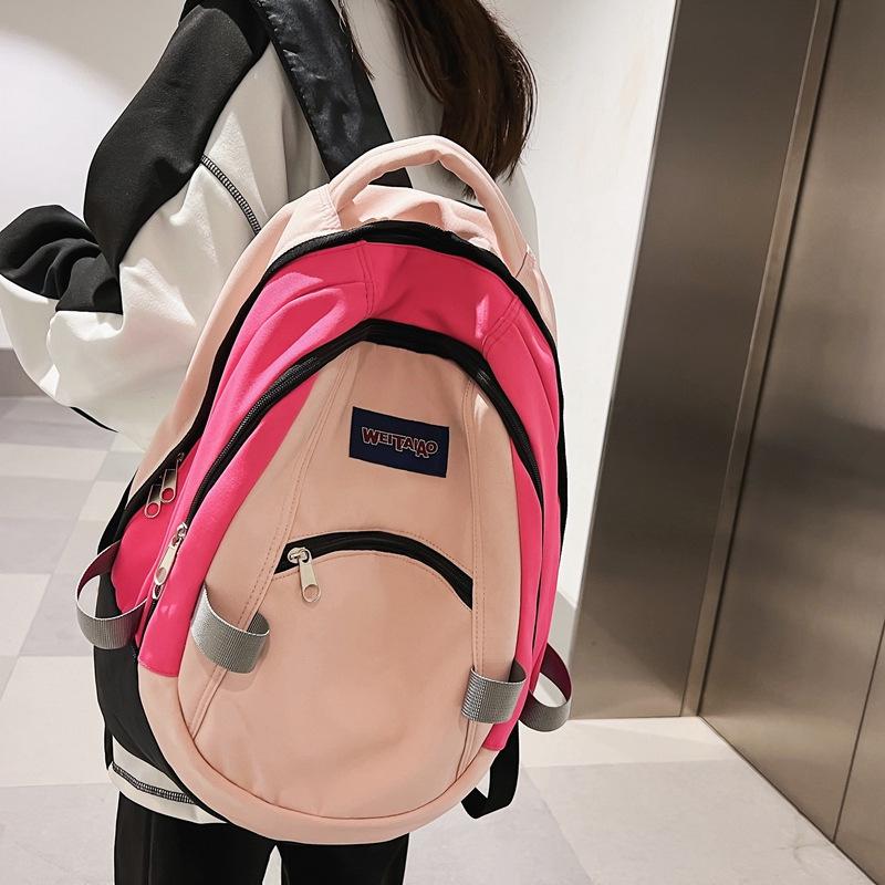 Korean ins trendy girl schoolbag student nylon backpack large capacity personalized contrasting backpack college student backpack розовый
