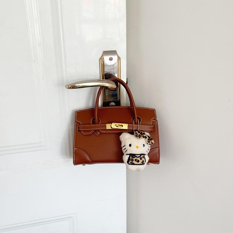 Sac à main de mode haut de gamme Automne/Hiver 2025: Sac bandoulière simple et polyvalent à fermeture à loquet pour femmes