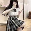 Wszechstronna spódniczka mini w czarno-białą kratę JJK Influencer na przybory szkolne - Dostępna, Blackboard News Cos