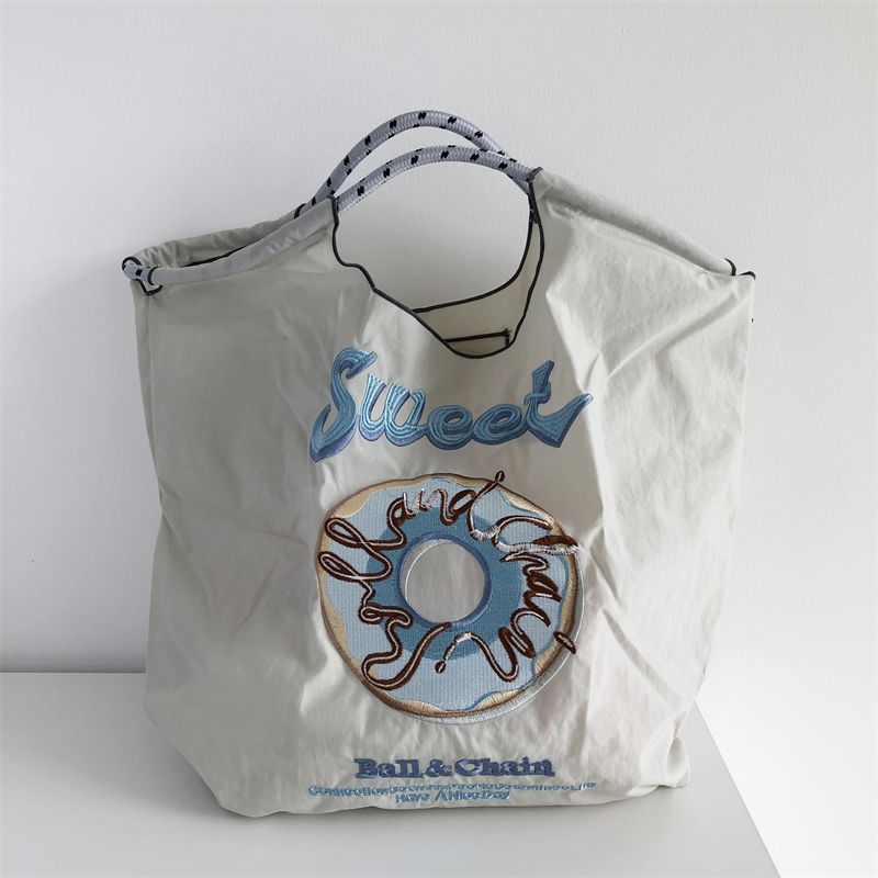 Niche Eco-Friendly Embroidered Nylon Shopping Tote - Handheld/Shoulder/Crossbody Bag with Artisanal Flair