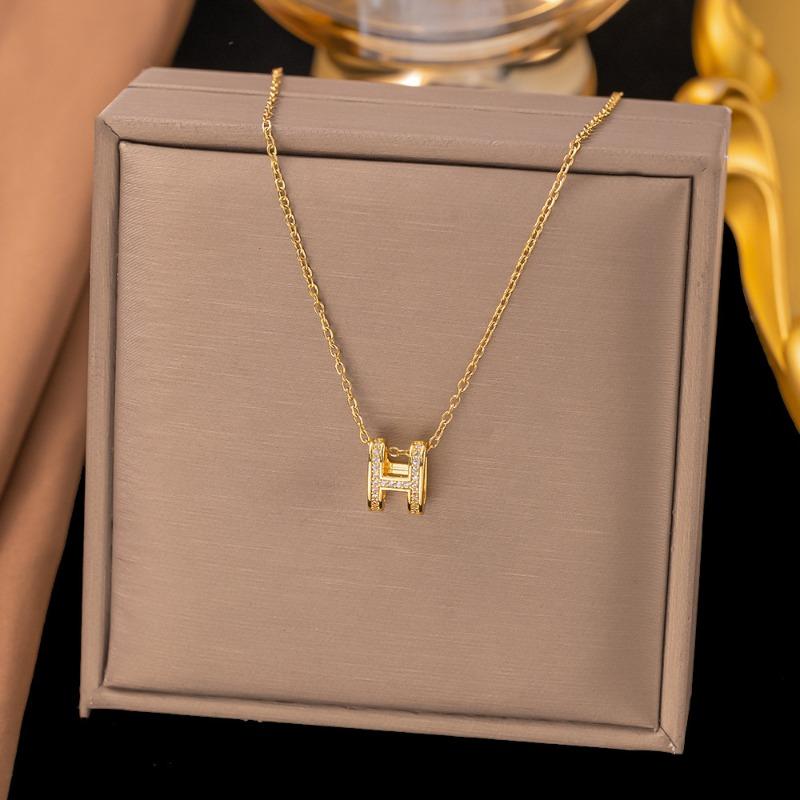 

Classic spring and summer new letter titanium steel necklace female cold wind design sense simple clavicle chain versatile neck chain