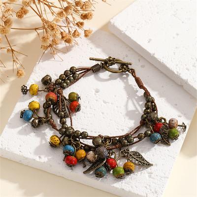 Retro Boheemse Literaire Kleine en Frisse Kersenparelketting Armband met Franjes, Zeldzaam en High-end Modieus Etnisch Accessoire.