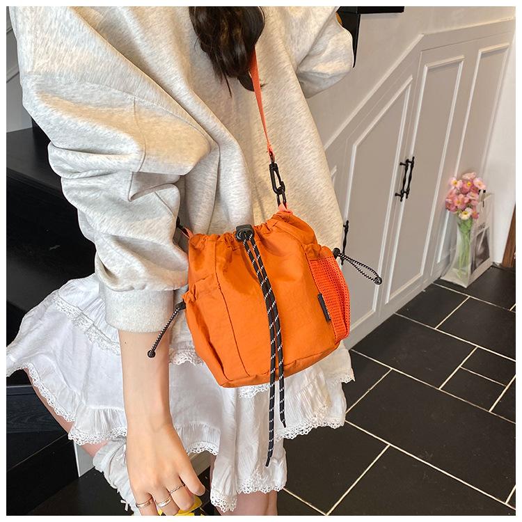 Canvas-Tasche Damen 2025 neue trendige Marke Handy-Tasche Freizeit Sport Reise Umhängetasche kleine Eimertasche