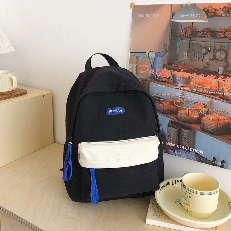 High value, fresh and sweet contrasting color backpack, light and multi-pocket backpack for primary and secondary school students