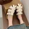 Leather baotou women's new summer hollowed-out woven one-pedal outer wear half-drag casual cool slippers