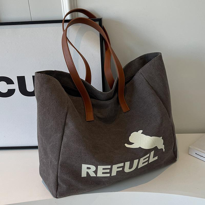 

Холщовая сумка большой вместимости женская высококлассная и универсальная с надписями под мышками на плечо