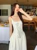 French suspender dress women's summer waist and thin knee long dress niche design sense floral A-shaped skirt tide