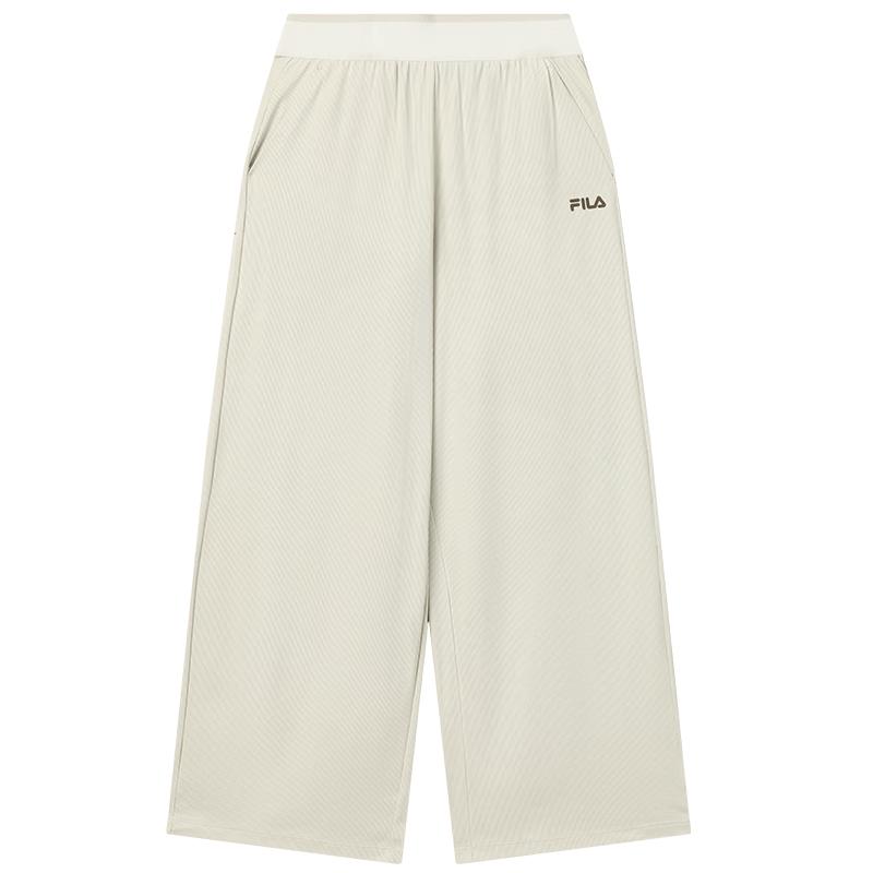 Женские трикотажные брюки клеш FILA XL бежевый
