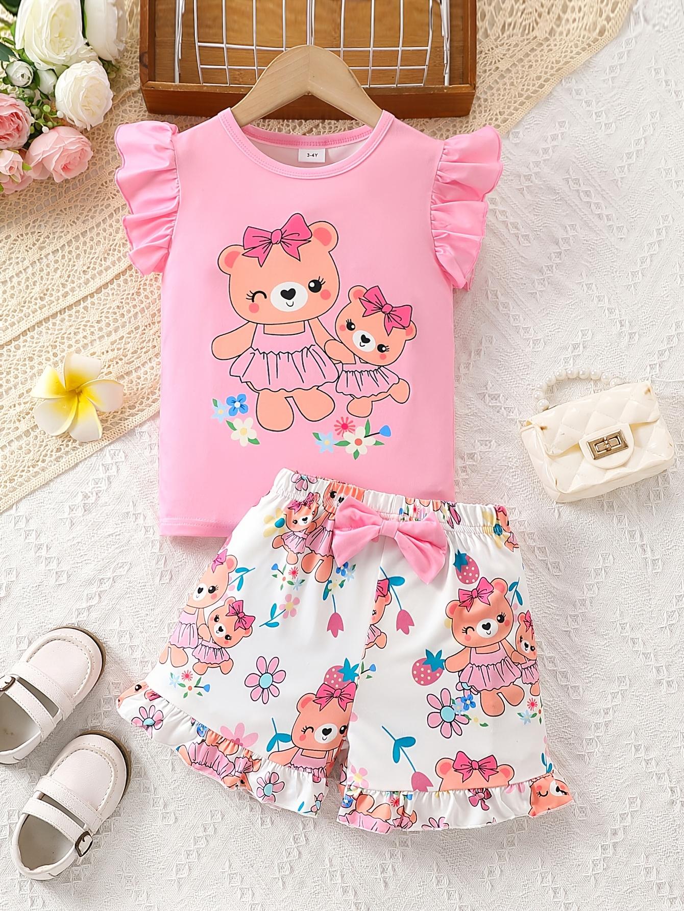 Girls’ summer two-piece set: short-sleeve printed top with a bow-adorned bear & butterfly cuffs, paired with matching all-over print shorts. 2-3Y розовый