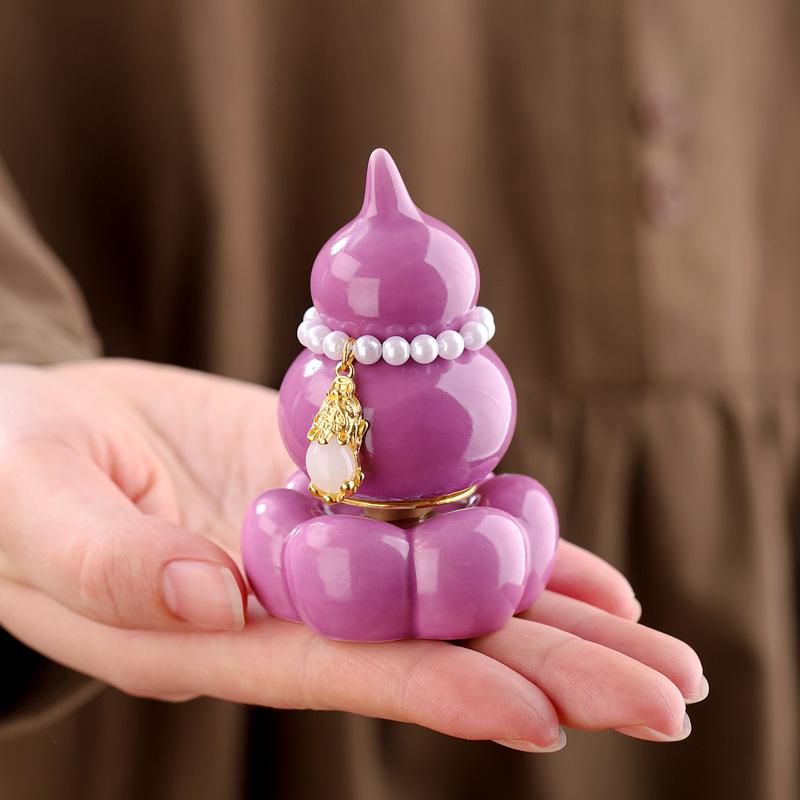 Vibrant Rotating Gourd Ornament: Stylish and Fun Tea Pet with Custom Logo Option