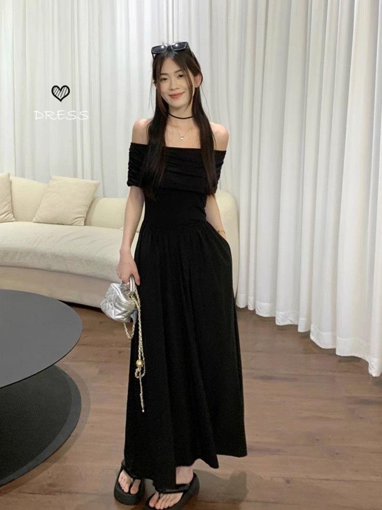 Black one-word shoulder dress women's summer 2026 new French temperament sexy waist and thin off-the-shoulder dress