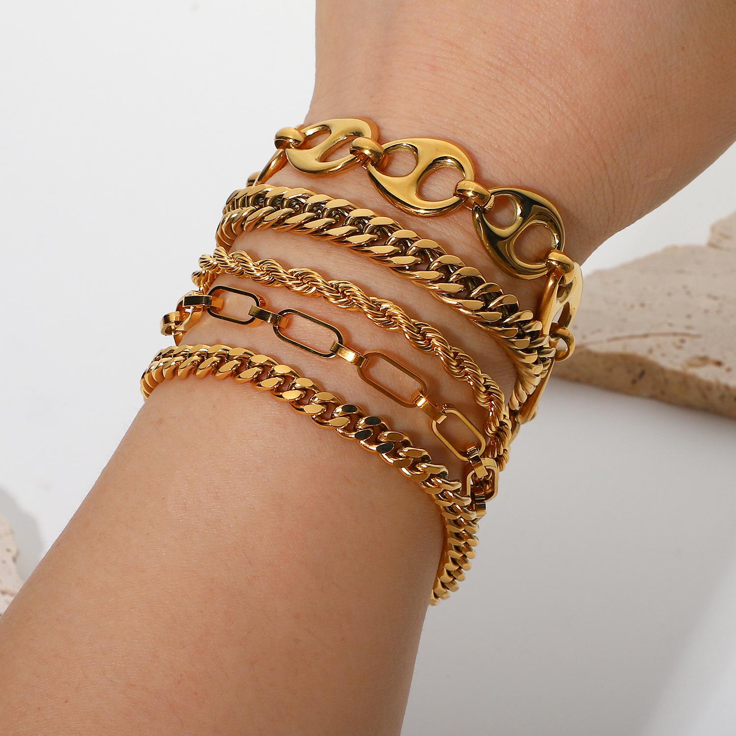 

18K Gold Plated Stainless Steel Layered Bracelet Set: Miami Cuban Chain, Bangle, Flat Snake Design for Women