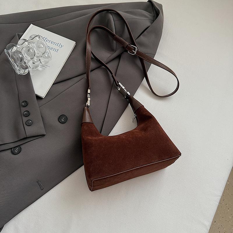 Hand Carry Fashion Dumpling Bag Women 2025 Autumn and Winter Korean Ins Simple Versatile Shoulder Bag Niche Trend Messenger Bag