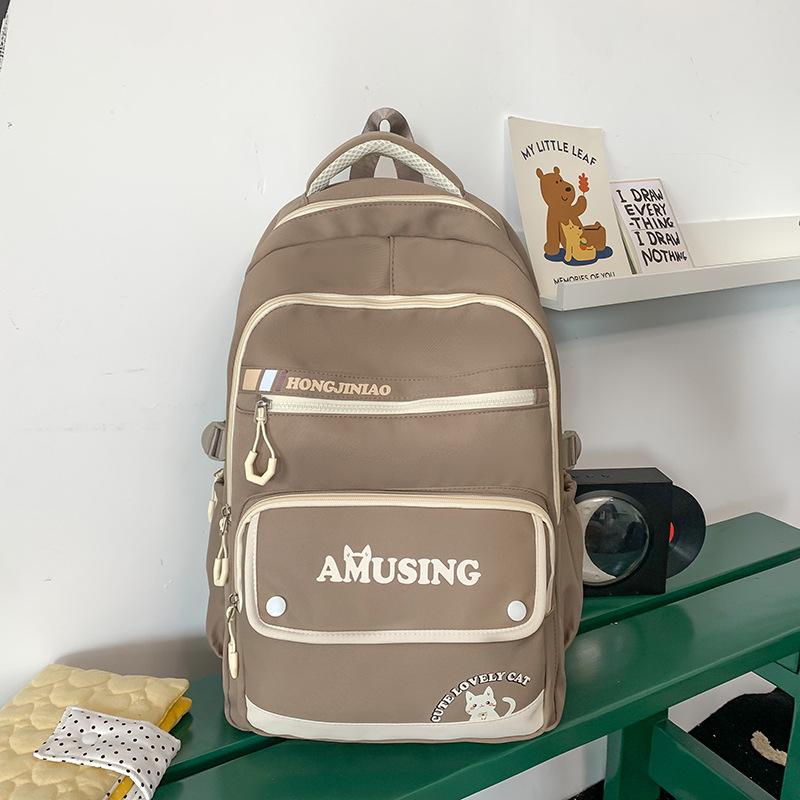 School bag Korean version big couple casual back high value teenager multi-compartment