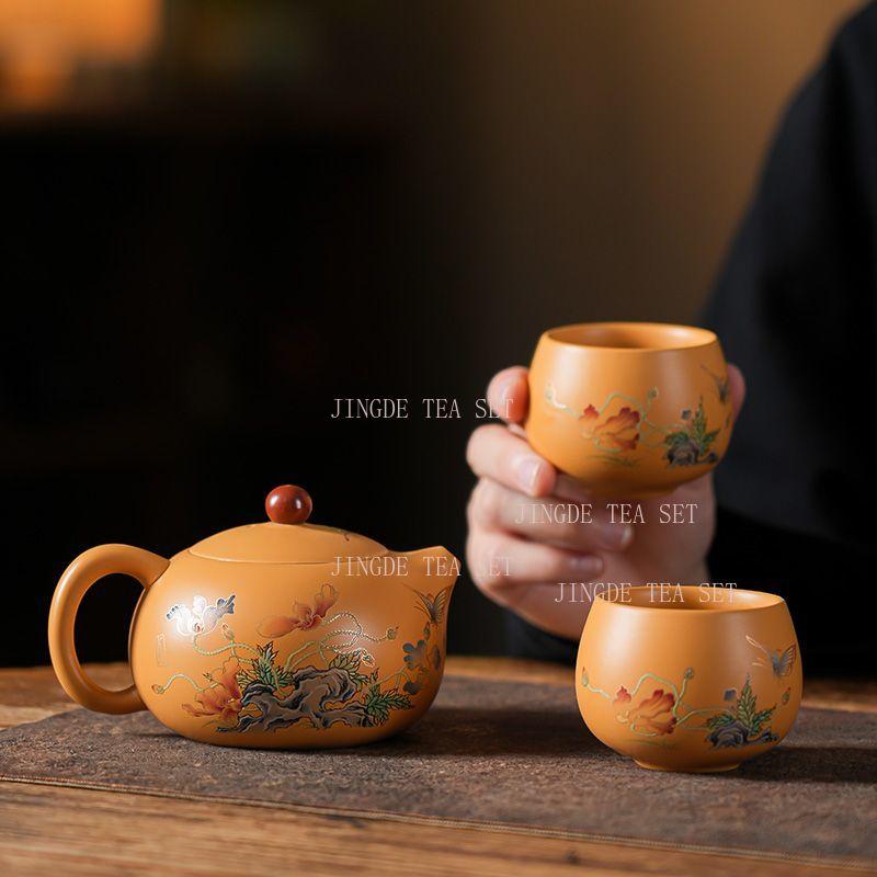 

A set of purple clay teapot two cups of Xi Shi tea pot tea cup Chinese hand-painted portable Kung Fu tea set