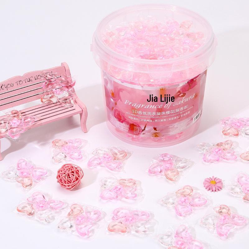 Sakura Laundry Pods: 5-in-1 Detergent with Softening Balls, Stain Removal & Long-Lasting Fragrance Beads.