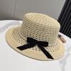 New Hollow Bow Pearl Straw Hat Women's Summer French Hepburn Style Flat Brim Sunshade Sun Protection Flat Top Straw Hat