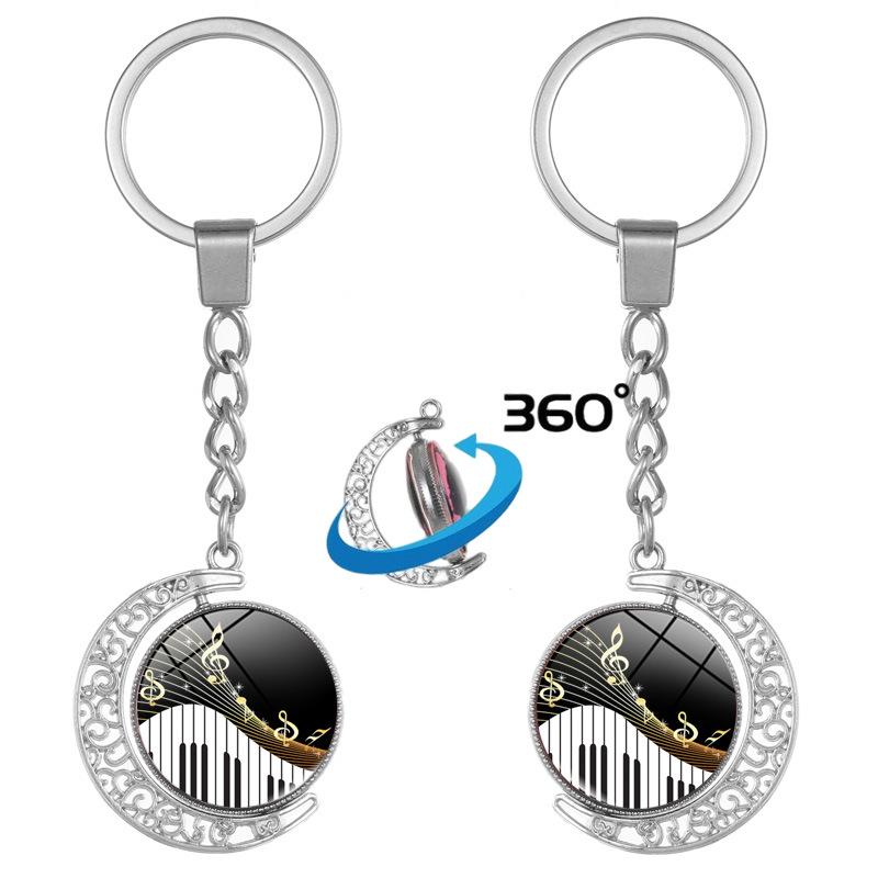 Heart-Shaped Rotating Piano Key Pendant Keychain with Gem and Musical Notes Ornament