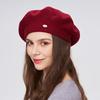A Women's Beret Knitted Woolen Hat with Autumn and Winter Thick Ear Protection Wool Hat and Shiny Diamond Decoration