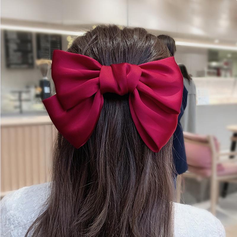 

Korean-Style Satin Bow Hair Clip: Elegant Fabric Accessory for a Fairy-like Look