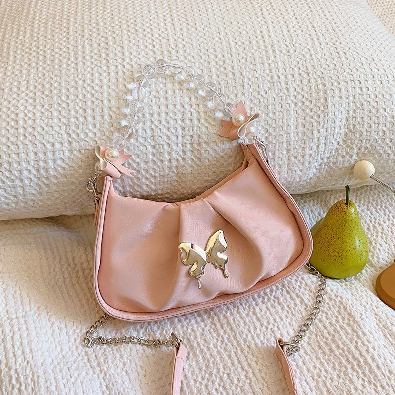 

Fashion summer niche design chain shoulder women s bag 2024 new trendy casual messenger bag crescent bag рожевий
