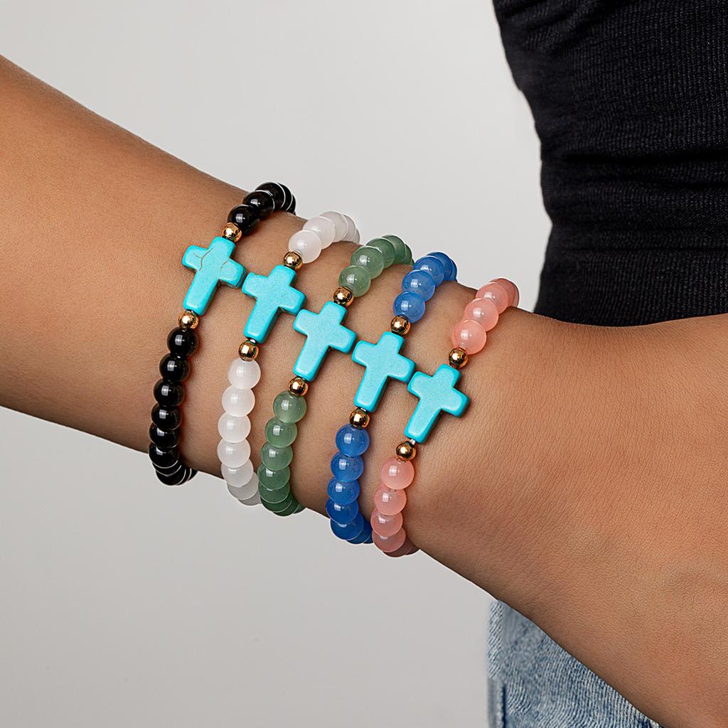 Bohemian style cross colored bead bracelet with multiple pieces of stacked women's bracelet set