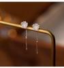 Camellia Ear Thread Earrings: 999 Sterling Silver Studs for Women - Comfortable Overnight Wear with Elegant Tassels.